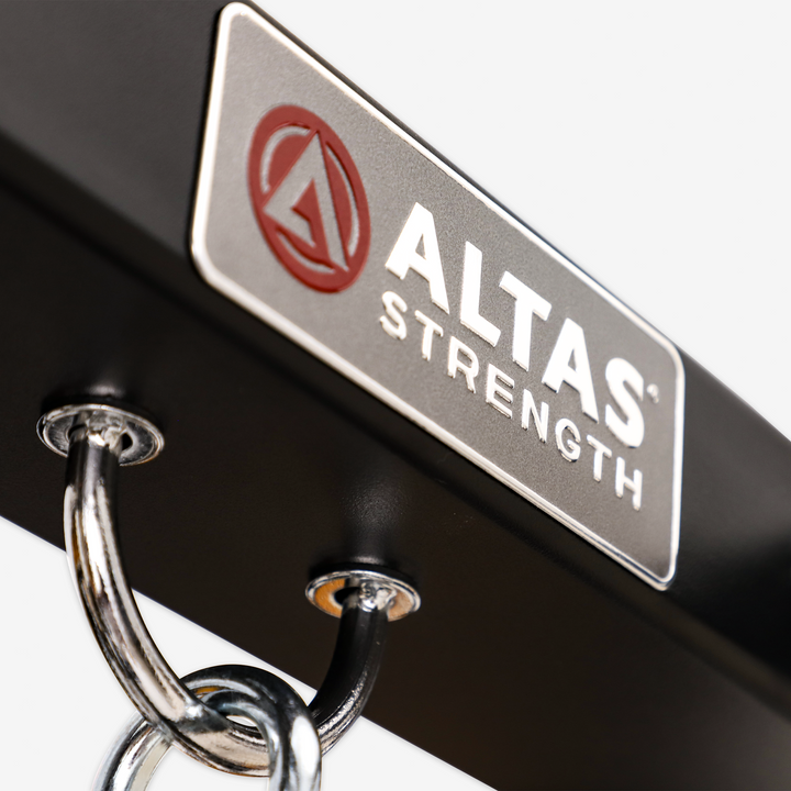 ALTAS STRENGTH logo on a fitness equipment component