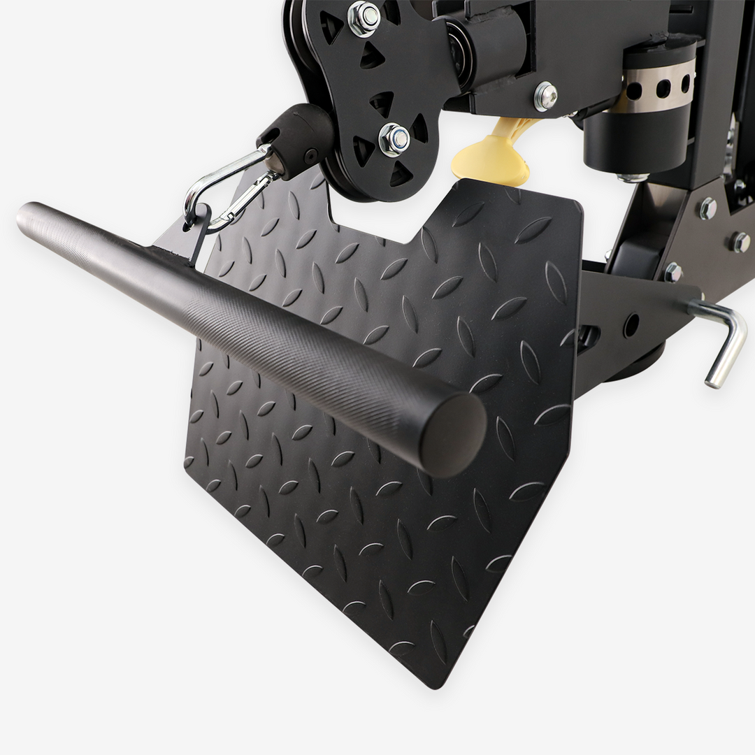 Black metal tool with textured surface and cylindrical handle on a white background