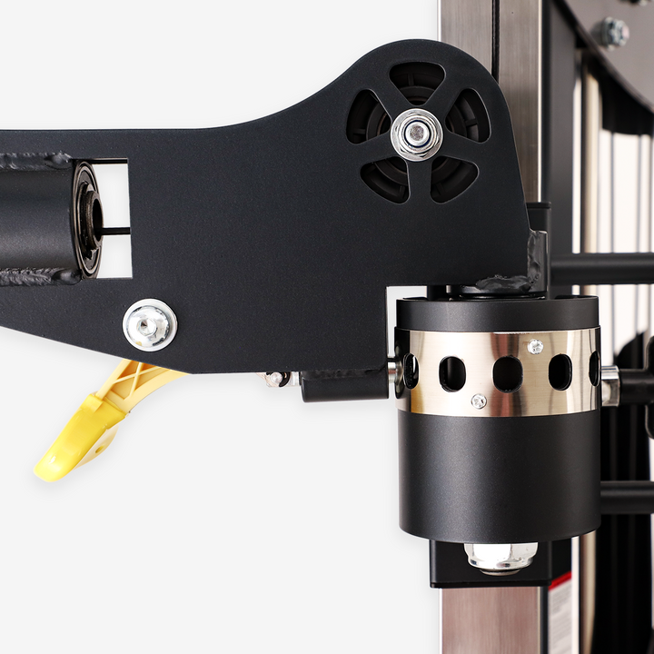 Close-up of a mechanical component with black and gold parts on a white background