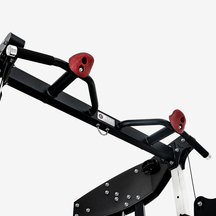 Black bicycle rack with red clamps on a white background