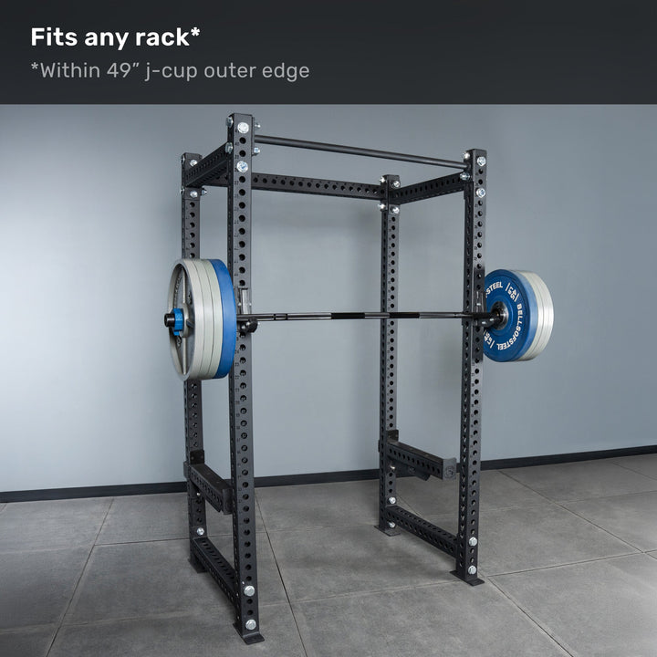 Short Rackable Barbell resting on a power rack