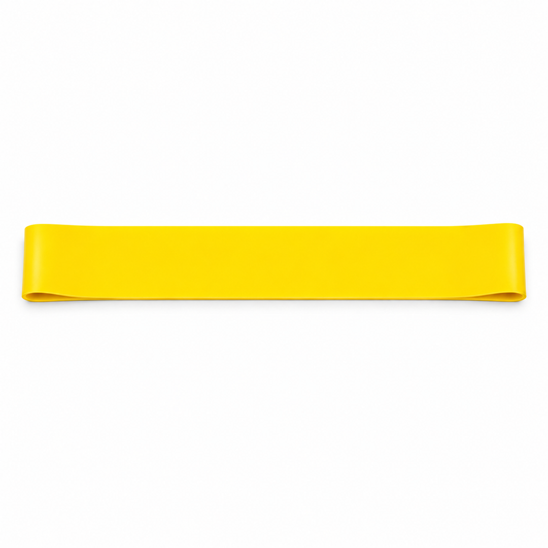 Yellow single mini loop resistance band on a white background