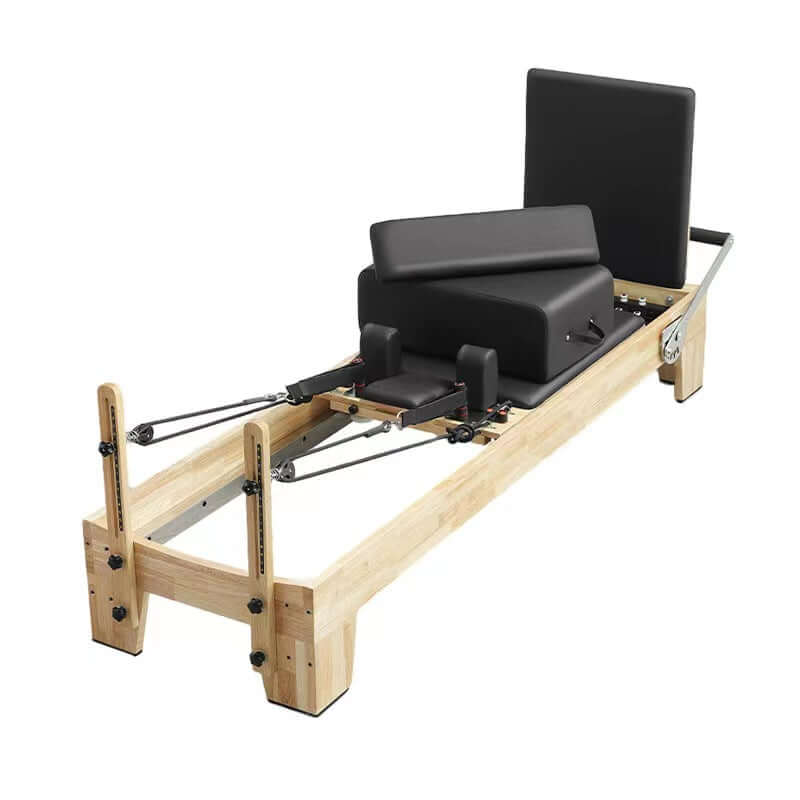 X-RIVAL Reformer Pilates Machine with adjustable springs and sliding carriage for resistance training.