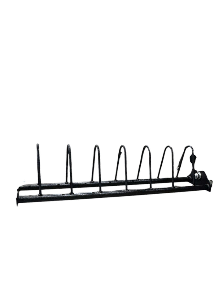 Metal weight plate storage rack for gym organization and space-saving design.